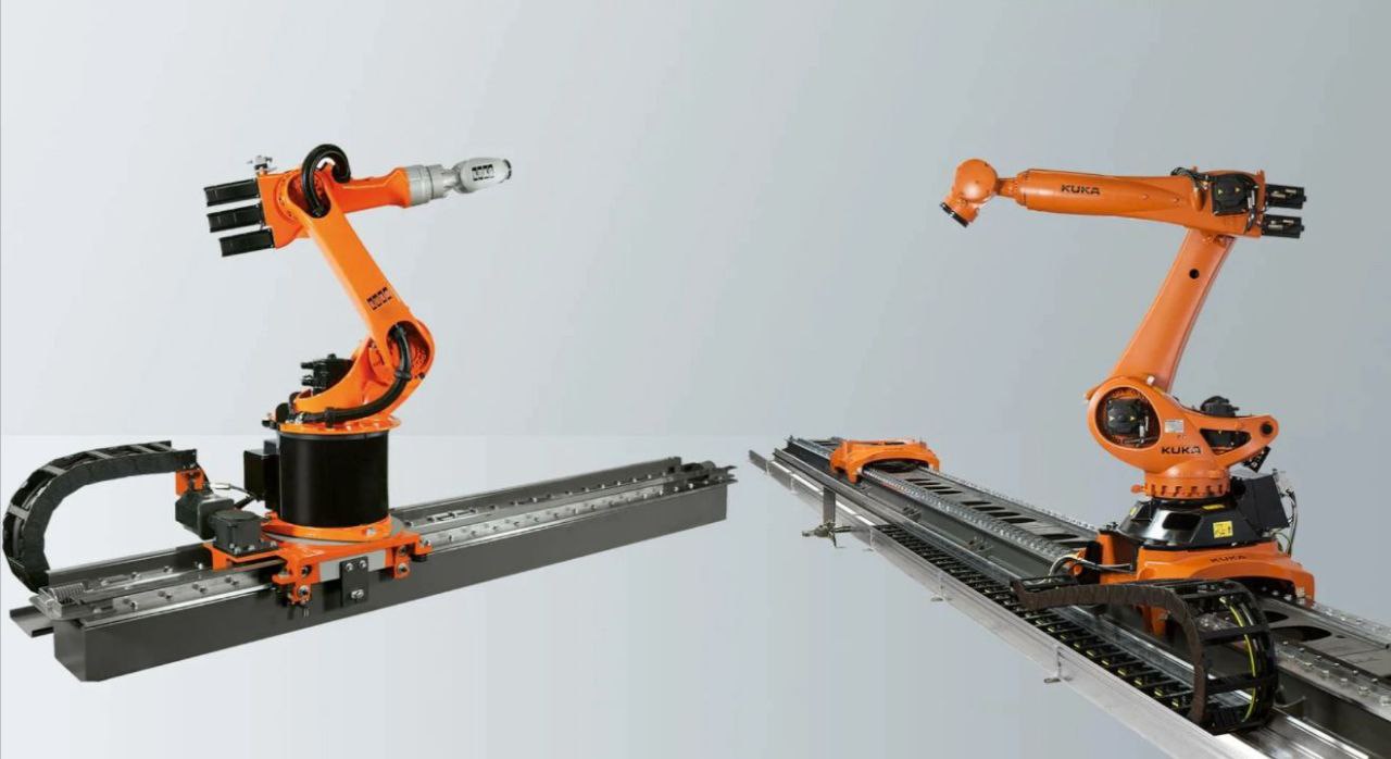 Industrial robot arm on a rail track, 7th axis.