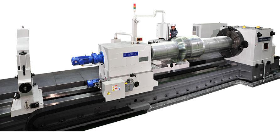 Heavy-duty shaft lathe with an operator.