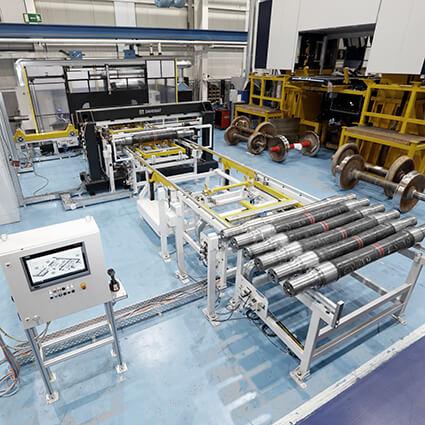 Production line for machining railway wagon shafts.
